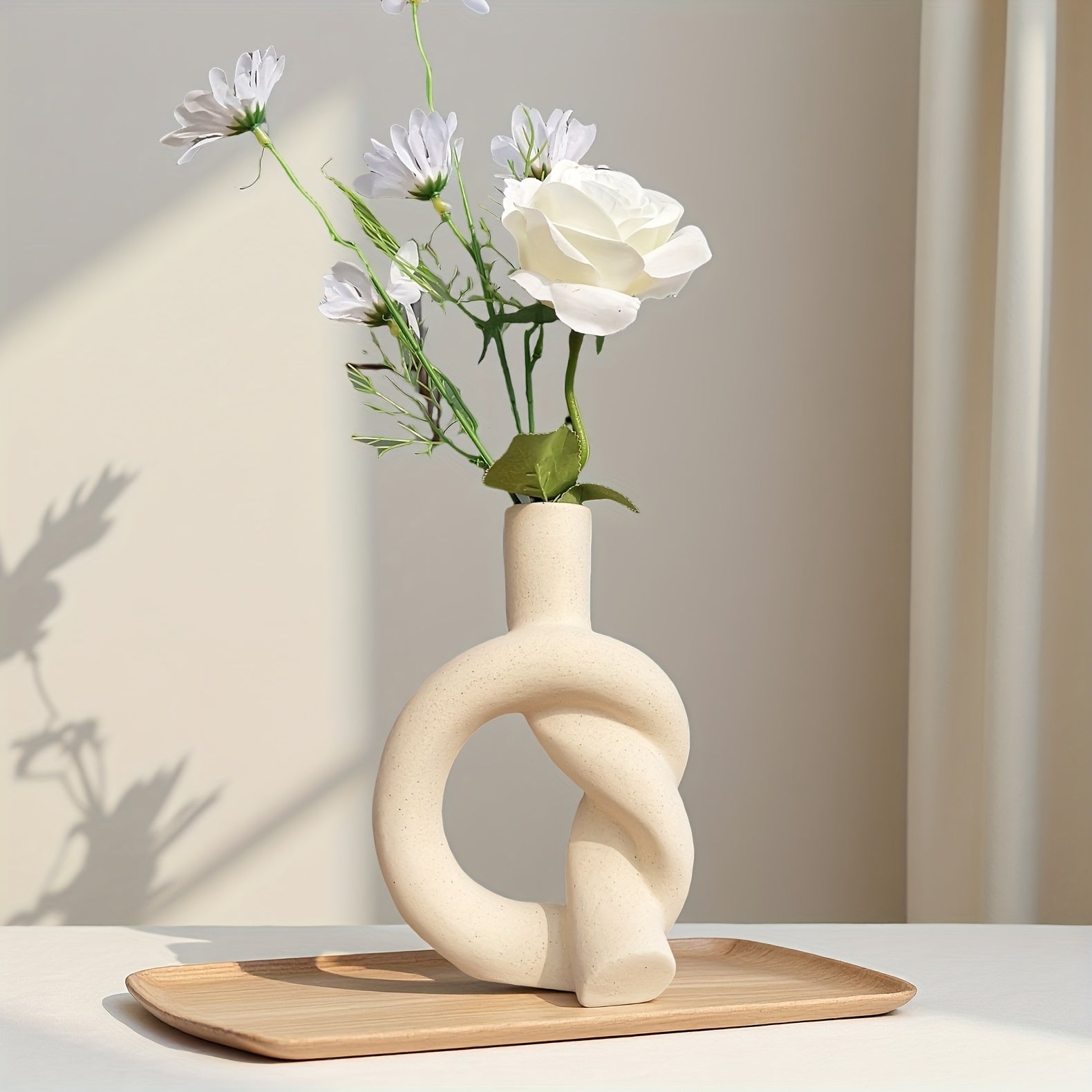 A Small-Sized Tabletop Vase with a Ceramic Matte End, Perfect for Home Decor, Decorative Vase, Candle Holder for Incense, in a Modern Minimalist Style, Featuring a Knot Design, Handcrafted